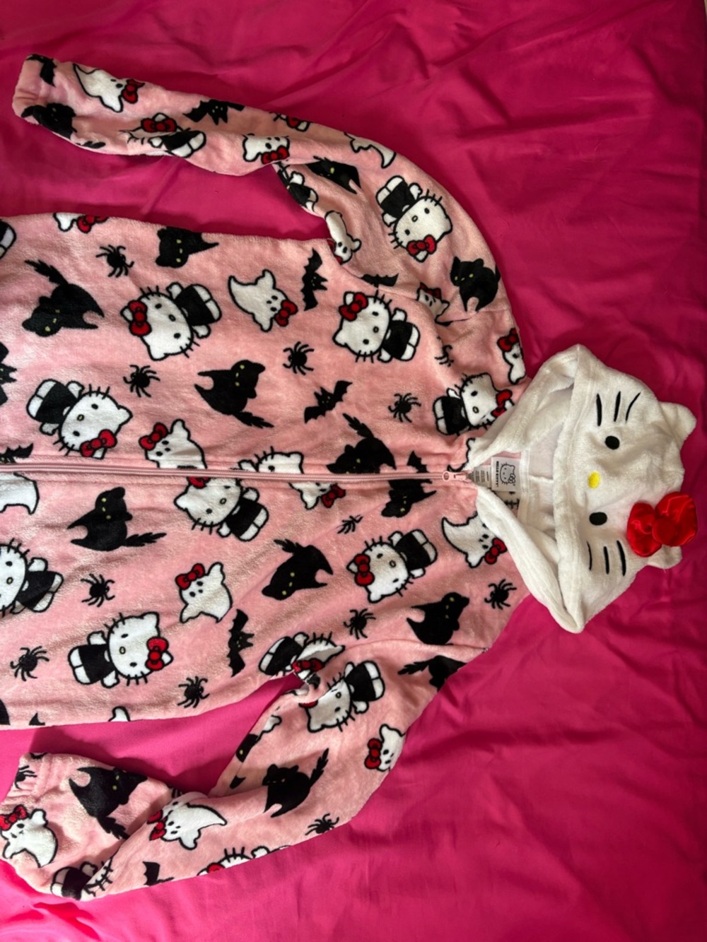 Sanrio Hello Kitty Pink Hooded Plush Onesie with Halloween print